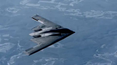 A B2 Stealth Bomber in the air