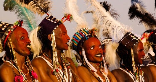 Wodaabe men dressed in traditional regalia for the Gerewol Festival