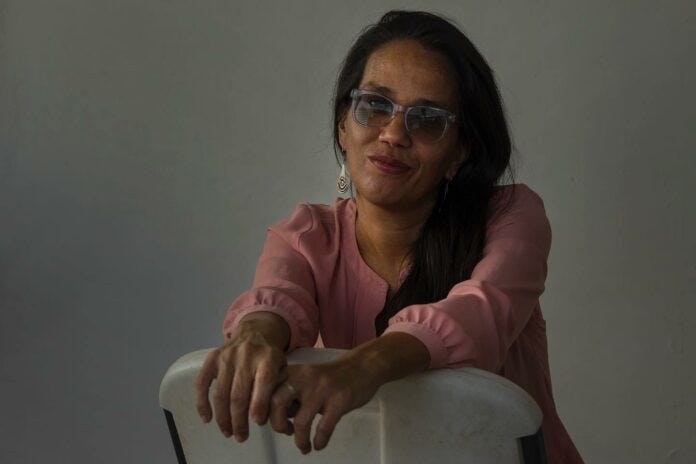 A person sitting on a chair

AI-generated content may be incorrect.