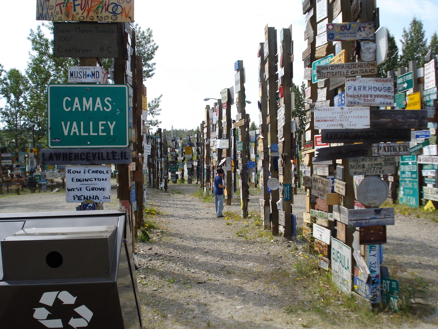 A forest of road signs in Watson Lake.