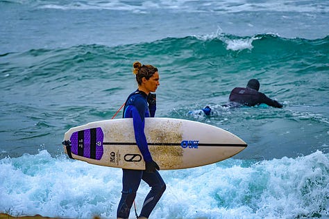 The Grande Plage and surfers