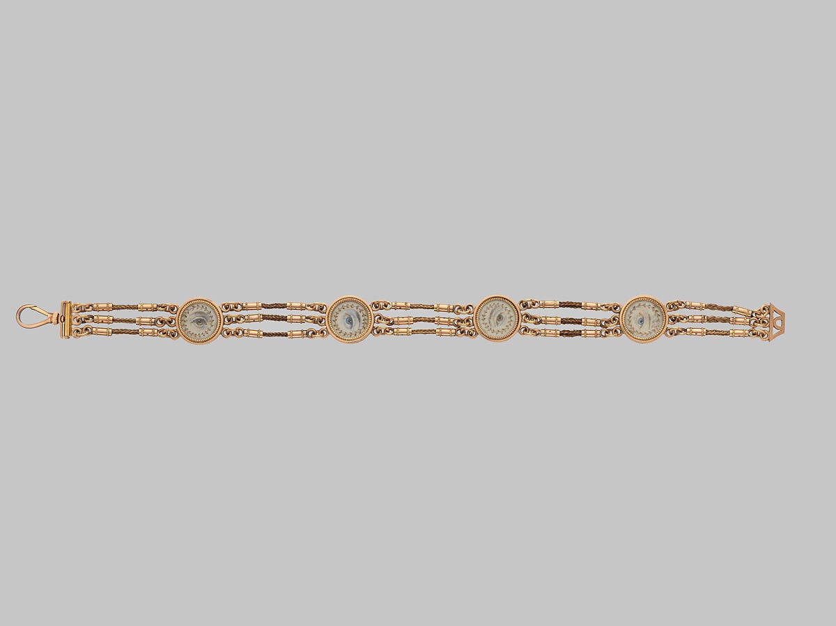 Lover’s Eye Watch Fob, 4 watercolor on ivory lover’s eyes set in gold cases and attached to a gold and hairwork chain, Probably British Lover’s Eye Watch Fob, 4 watercolor on ivory lover’s eyes set in gold cases and attached to a gold and hairwork chain, Probably British
