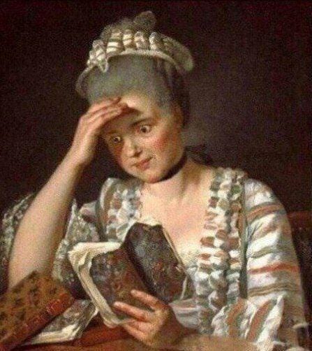 A person reading a book

Description automatically generated