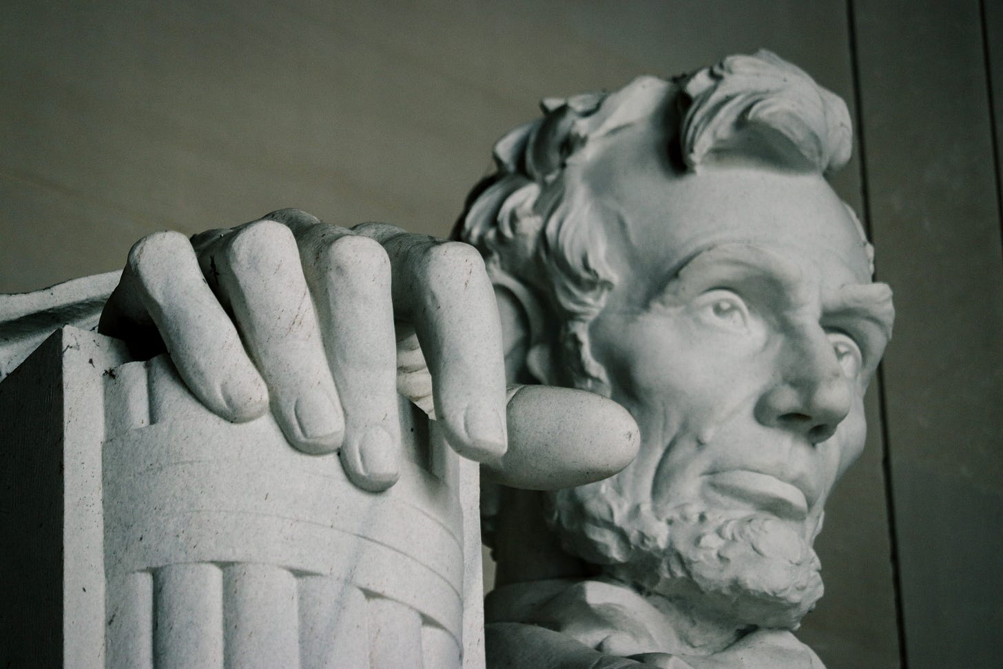 Upclose photo of the face of the Abraham Lincoln statue at the Lincoln Memorial Upclose photo of the face of the Abraham Lincoln statue at the Lincoln Memorial