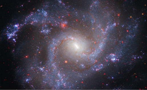 This image showcases the galaxy's well-defined spiral arms filled with young blue stars, star-forming regions, and interstellar dust. This image showcases the galaxy's well-defined spiral arms filled with young blue stars, star-forming regions, and interstellar dust.
