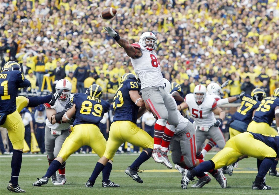 Ohio State senior Doug Worthington just misses blocking a punt from Michigan's Zoltan Mesko.<BR><img src=http://www.toledoblade.com/graphics/icons/photo.gif> <font color=red><b>VIEW</b></font>: <a href="/apps/pbcs.dll/gallery?Site=TO&Date=20091121&Category=SPORTS16&ArtNo=112109996&Ref=PH" target="_blank"> <b> Ohio State - Michigan photo gallery (Nov. 21, 2009) </b></a> (Nov. 21, 2009)