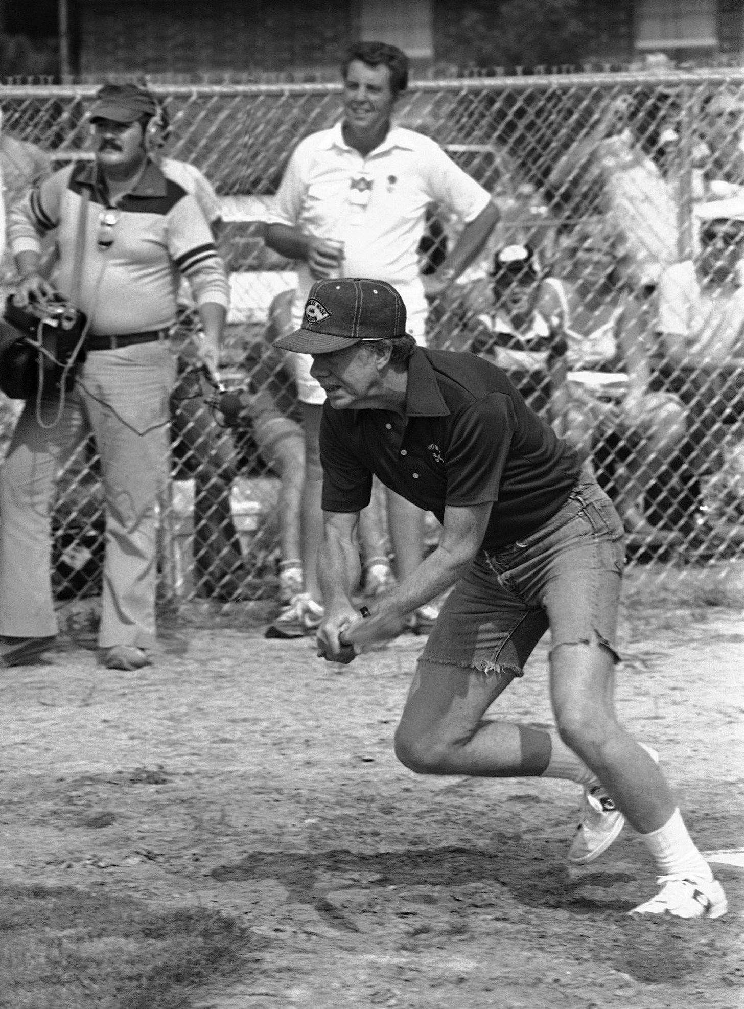 President Jimmy Carter digs out for first base during a softball game with his brother Billy's team in Plains, Georgia, August 19, 1978, while vacationing in his hometown. President Jimmy Carter digs out for first base during a softball game with his brother Billy's team in Plains, Georgia, August 19, 1978, while vacationing in his hometown.