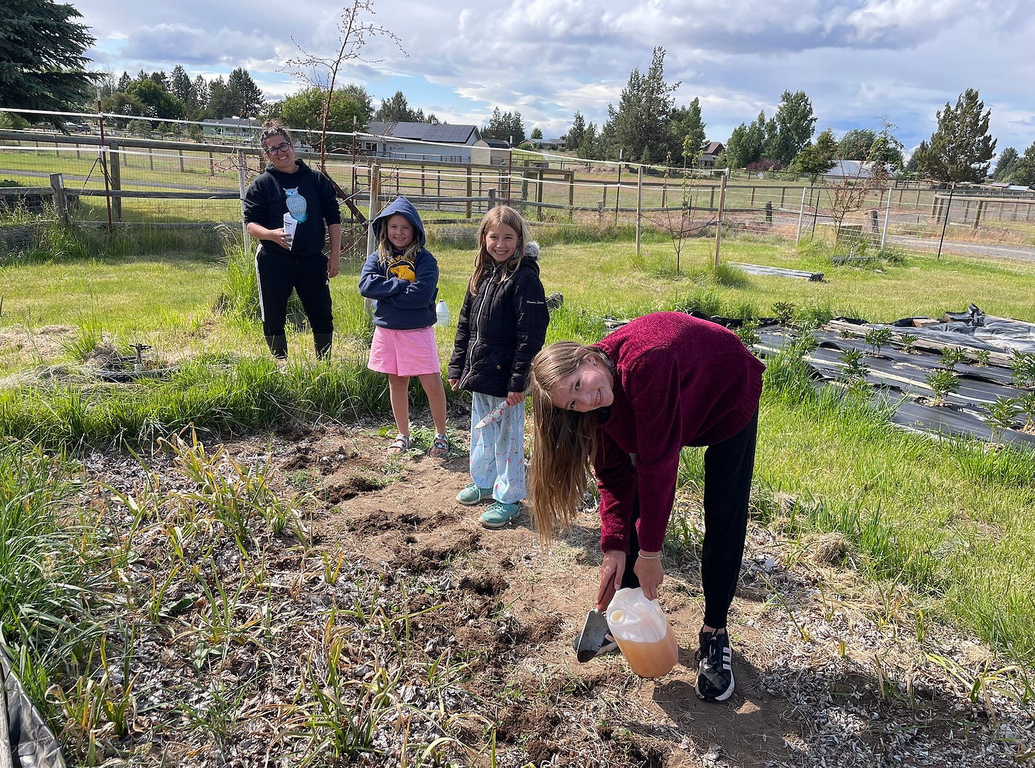 Kids Planting.png