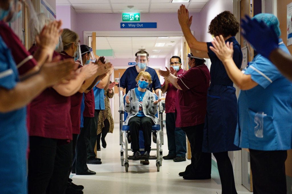 First People Receive COVID-19 Vaccine in the UK