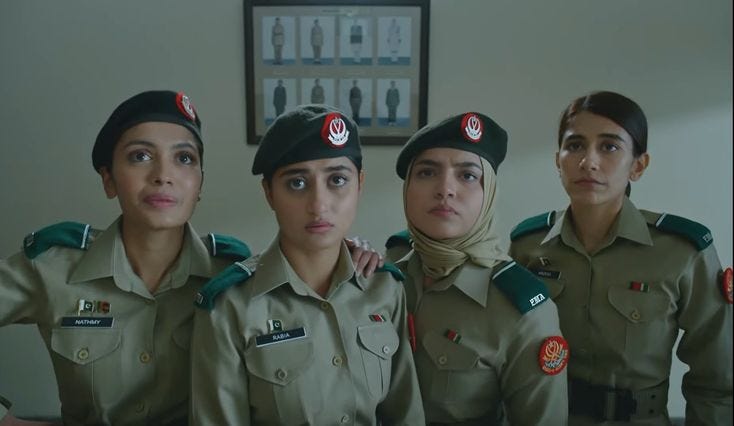 This may contain: three women in uniform standing next to each other