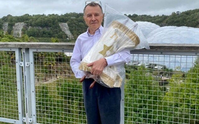 Community chair Jeremy Jacobson OBE with the historic scroll during filming of the Antiques Roadshow at the Eden Project, Cornwall. Community chair Jeremy Jacobson OBE with the historic scroll during filming of the Antiques Roadshow at the Eden Project, Cornwall.