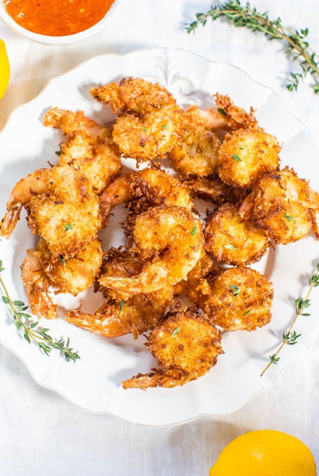 Coconut Shrimp with Orange-Chili Dipping Sauce - Plump, juicy shrimp with a crispy, crunchy coconut coating!! Fast, easy, and better than you get in restaurants! Will be your new favorite shrimp recipe!! Coconut Shrimp with Orange-Chili Dipping Sauce - Plump, juicy shrimp with a crispy, crunchy coconut coating!! Fast, easy, and better than you get in restaurants! Will be your new favorite shrimp recipe!!