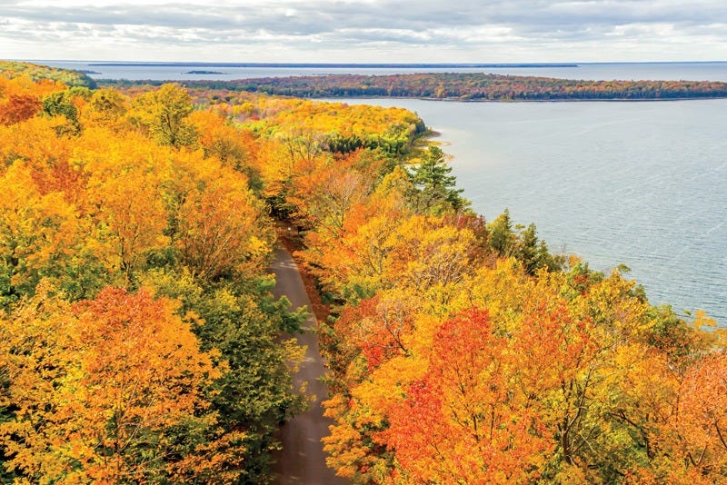 door county road in autumn door county road in autumn