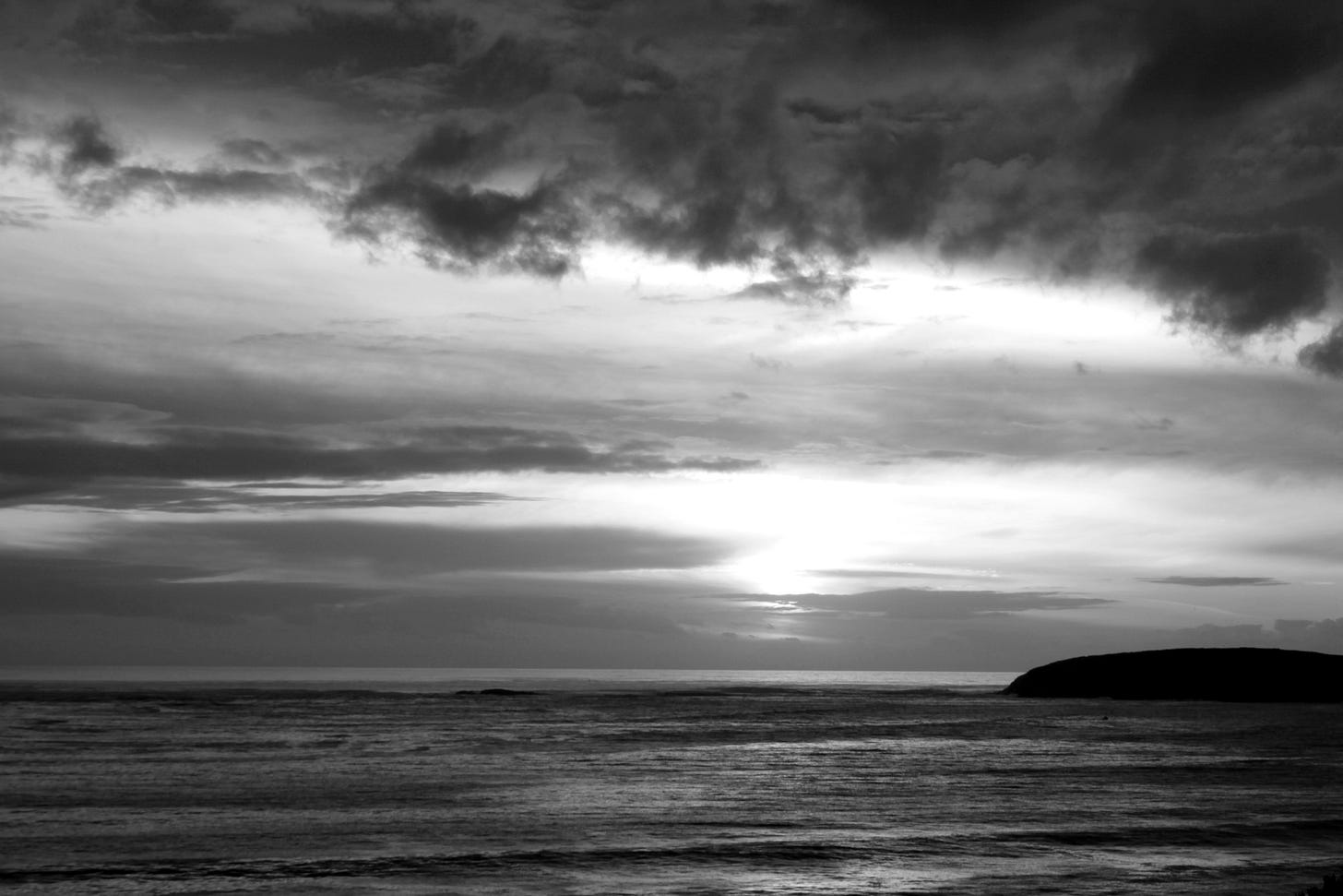 Storm clouds gather over the ocean. Storm clouds gather over the ocean.