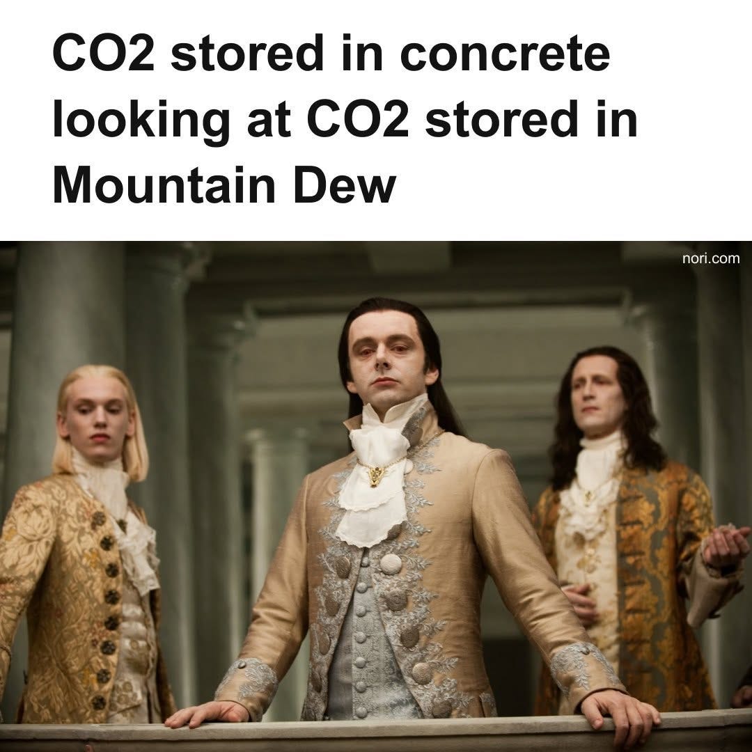 Text: "CO2 stored in concrete looking at CO2 stored in Mountain Dew." Below, three pale Volturi vampires from Twilight gazing down disdainfully from a balcony.