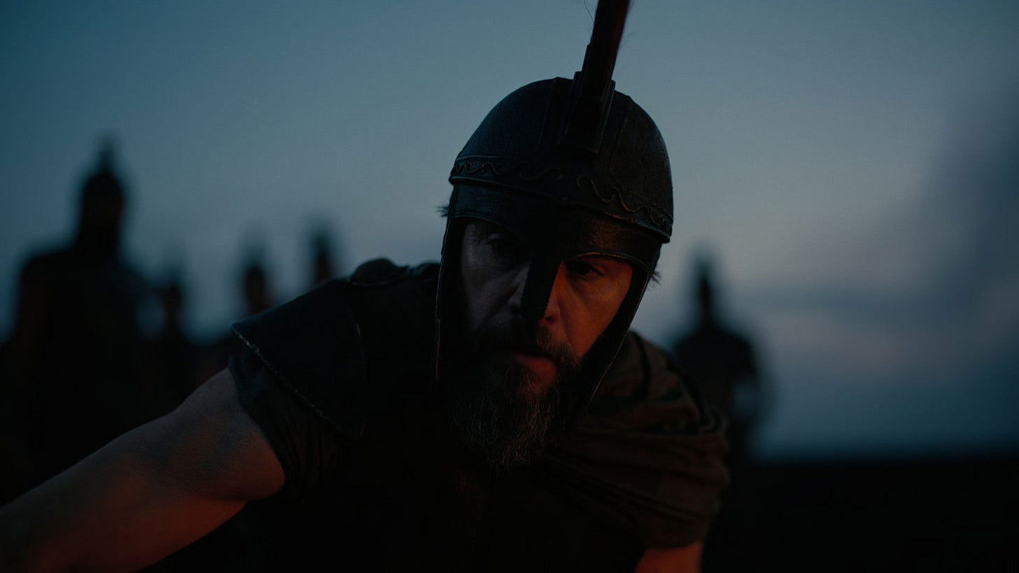 The Odyssey | Still features Matt Damon as Odysseus in the shadows.