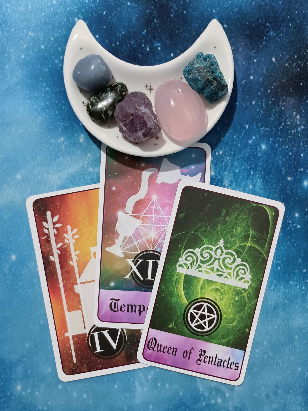 From Stress to Breath: A Message From the Universe, 3 Celestial Tarot cards and crystals on a starry blue background From Stress to Breath: A Message From the Universe, 3 Celestial Tarot cards and crystals on a starry blue background