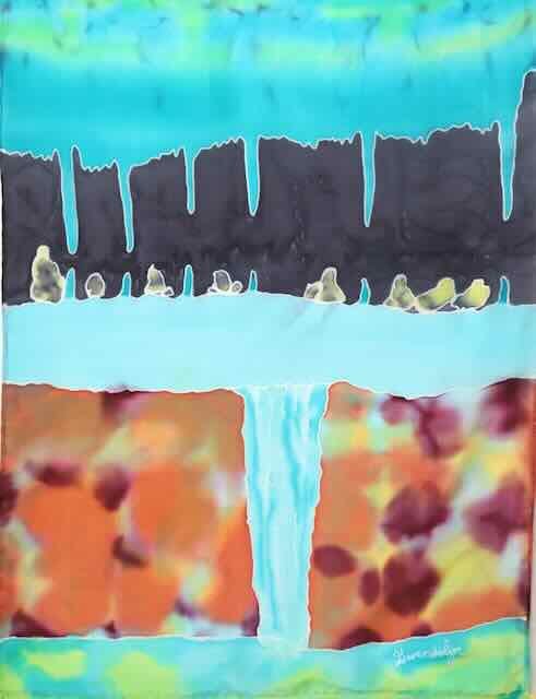 Detail of silk painting showing aqua blue waterfall flowing against orange cave wall background