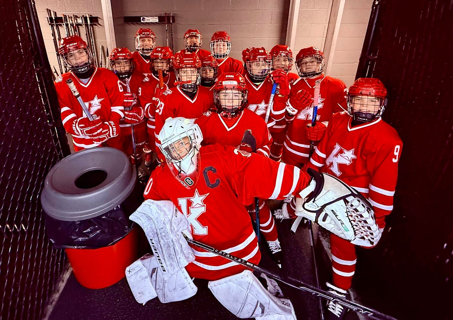 May be an image of hockey and text May be an image of hockey and text