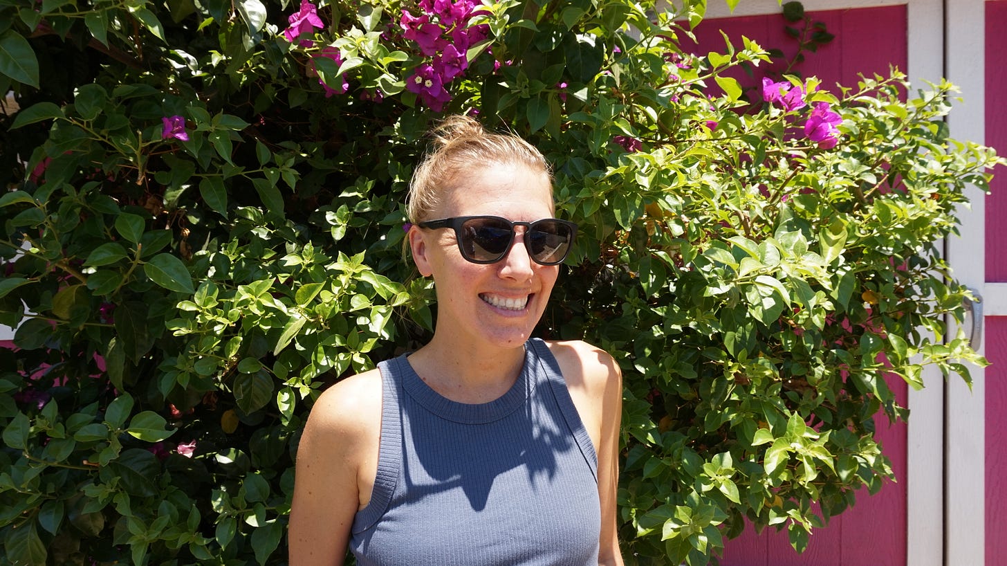 Kate Olson AKA The LA Running Connoisseur in front of a bougainvillea, a common Los Angeles area plant. Kate Olson AKA The LA Running Connoisseur in front of a bougainvillea, a common Los Angeles area plant.