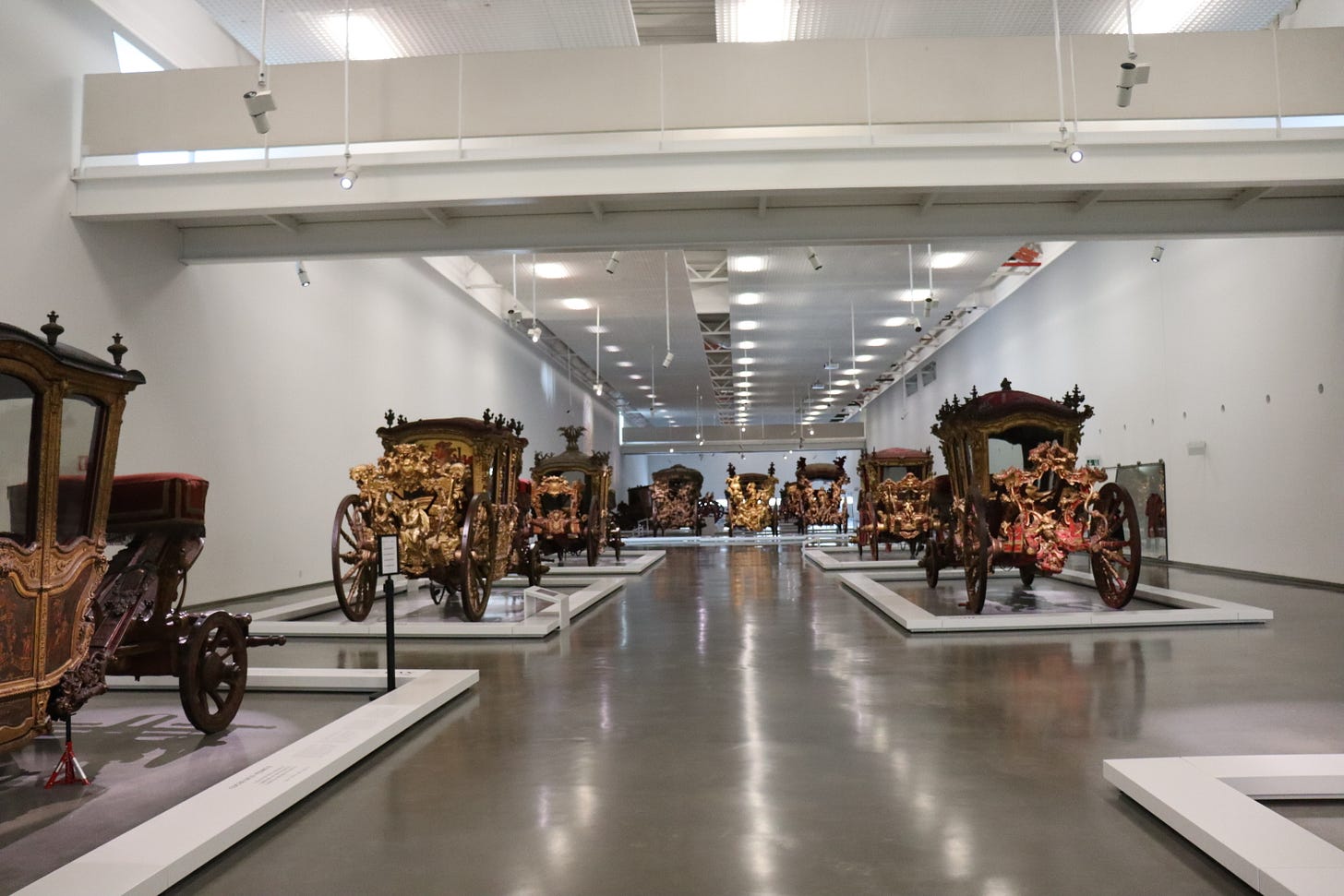 Image of several coaches on display.