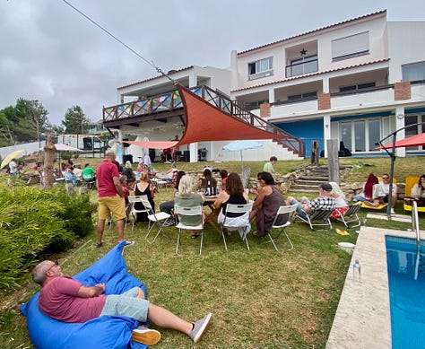 people outside having a party, playing live music and a swimming pool and bbq