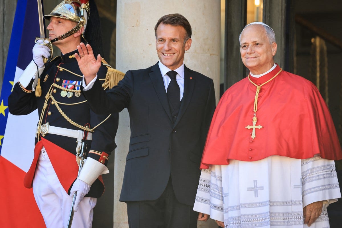 Emmanuel Macron welcomes Pope Leo XIV to the Élysée Palace