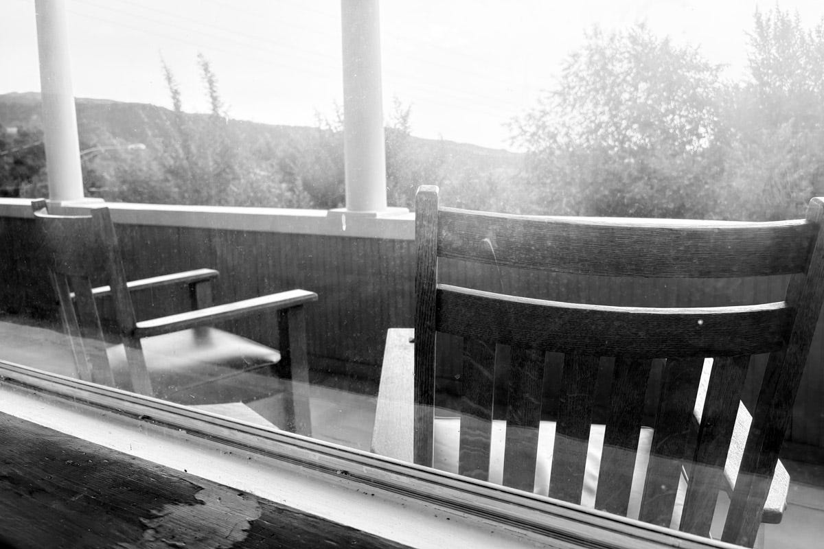 Zach Miller - rocking chairs on porch