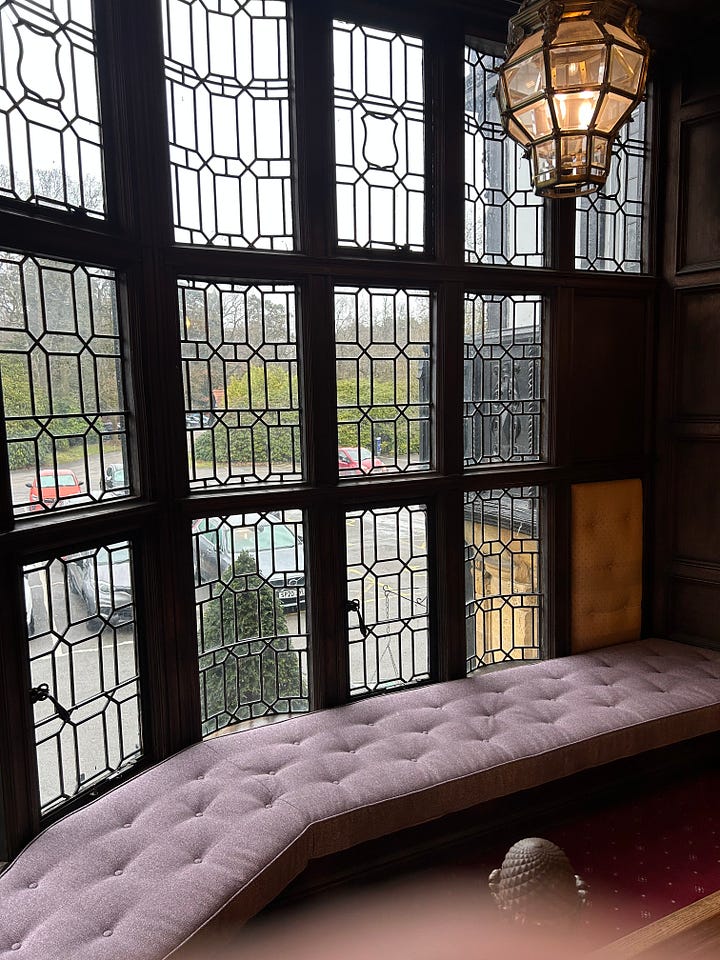 Four images of the grand hand-carved oak staircase at Petwood Hotel, Woodhall Spa. 