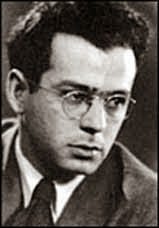 A person wearing glasses and a suit

AI-generated content may be incorrect.