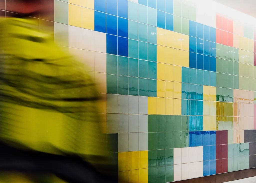 The colors in Spencer Finch’s mural installation were each inspired by Obama’s formative years in Nairobi, Chicago, Honolulu and Jakarta and personally selected by the former president. 