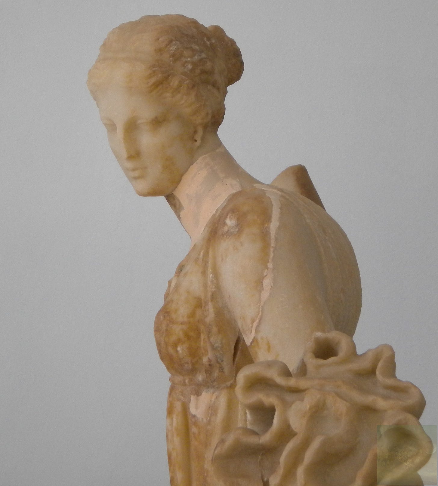 An ancient Greek statue of a woman.