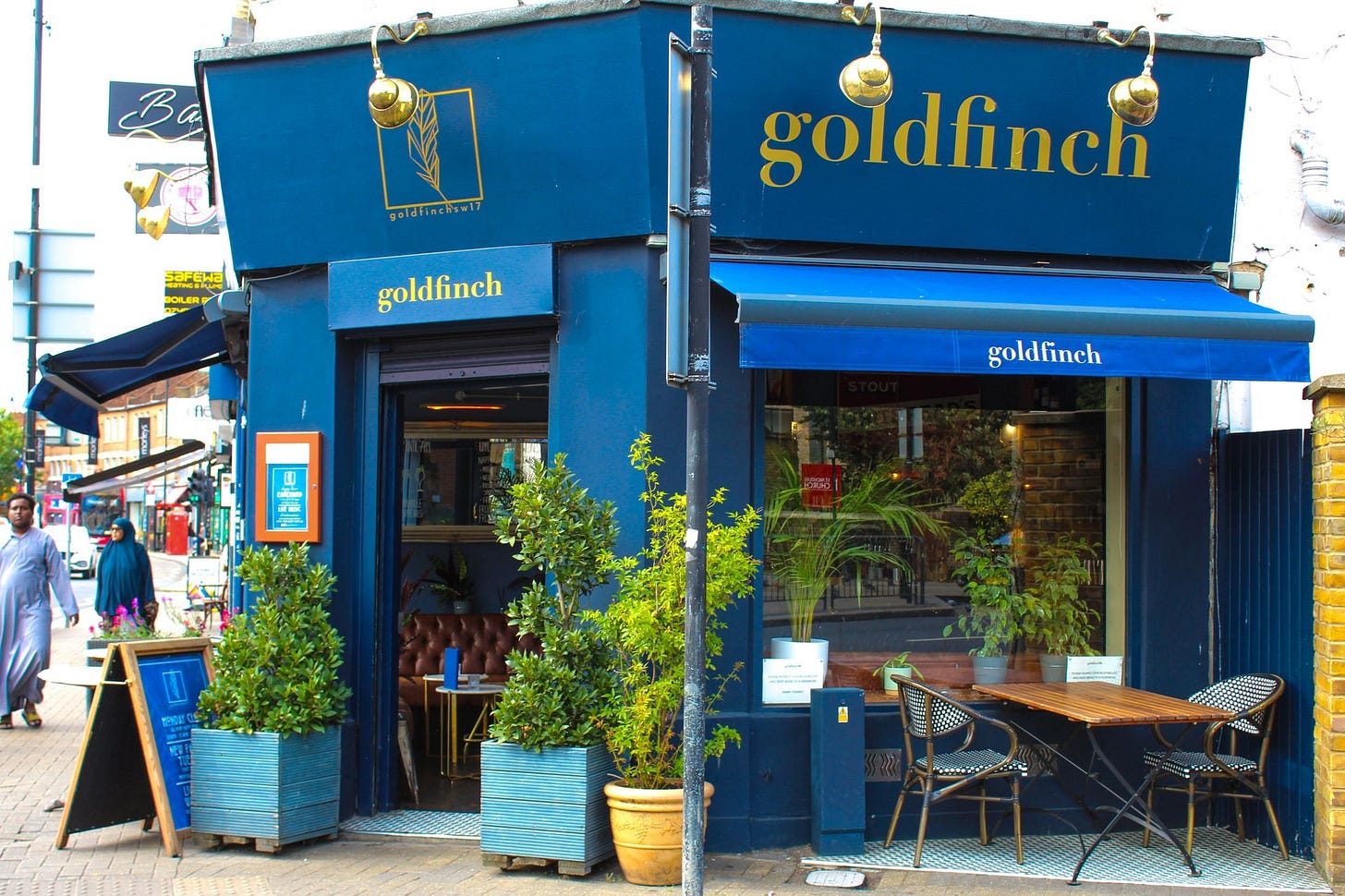 May be an image of 2 people and text