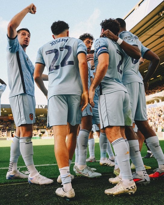 The team celebrate with Joe Gelhardt