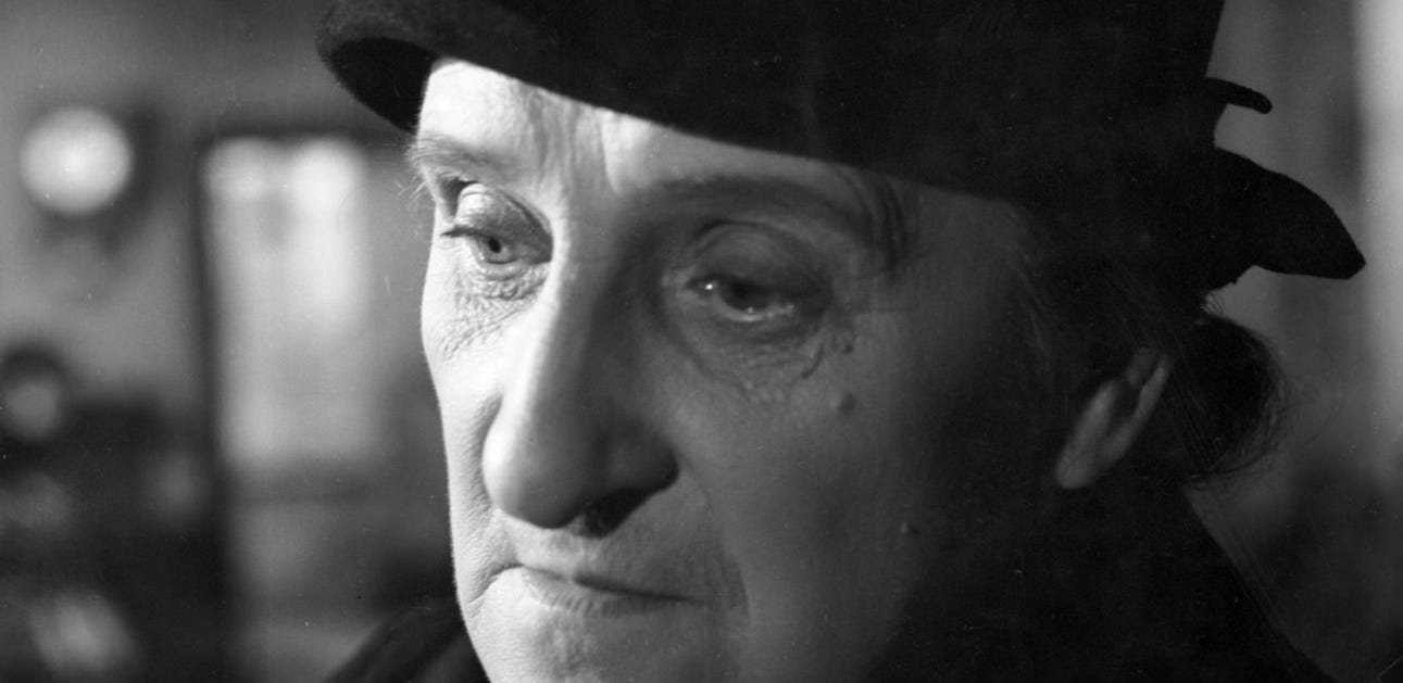 Józef Malina (Jan Ciecierski), Jakub's elderly friend, protector, and former cellmate.