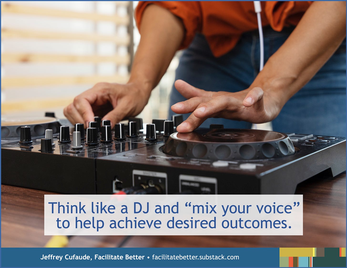 close-up of a dj’s hands on a mixing board