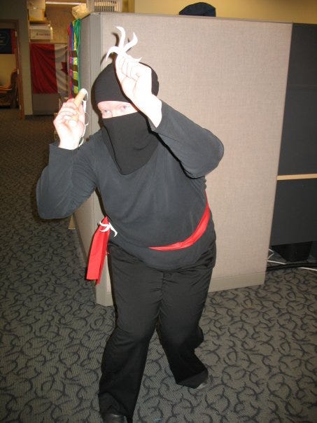 2 photos of me in a costume - all black with a black face covering and red bed throwing a paper star.