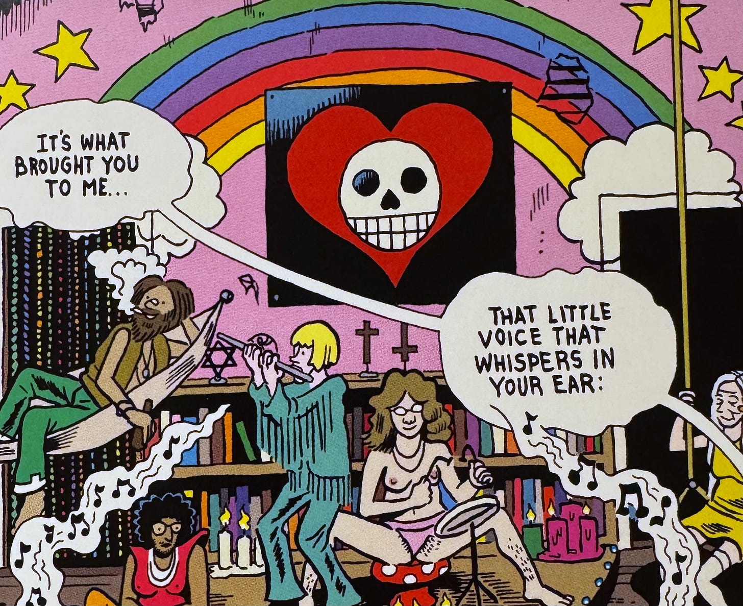 A cropped shot from a full page panel of Cali's communal house. I'm focused on a piece of iconography at the center of my crop. Surrounded by a handful of hippies, smoking, playing flute and some kind of percussion (dialogue from Cali, cropped out of the picture: "It's what brought you to me…that little voice that whispers in your ear:"), on a wall that is otherwise painted purple-pink with a full color rainbow on it, there is a square poster. A black field, within the black field a huge red heart. Within the heart a very simplified white skull, drawn as a circle with two round eyes, a nose hole shaped like and upside down heart, echoing the large heart it sits within, and a set of teeth along the bottom third of the circle, horizontal line at the top and one in halfway to the bottom and perpendicular lines delineating almost square, slightly rectangular teeth. This icon is repeated as a huge image on the title page of the book. It seems like a subversion of Punisher's skull icon to me. A cropped shot from a full page panel of Cali's communal house. I'm focused on a piece of iconography at the center of my crop. Surrounded by a handful of hippies, smoking, playing flute and some kind of percussion (dialogue from Cali, cropped out of the picture: "It's what brought you to me…that little voice that whispers in your ear:"), on a wall that is otherwise painted purple-pink with a full color rainbow on it, there is a square poster. A black field, within the black field a huge red heart. Within the heart a very simplified white skull, drawn as a circle with two round eyes, a nose hole shaped like and upside down heart, echoing the large heart it sits within, and a set of teeth along the bottom third of the circle, horizontal line at the top and one in halfway to the bottom and perpendicular lines delineating almost square, slightly rectangular teeth. This icon is repeated as a huge image on the title page of the book. It seems like a subversion of Punisher's skull icon to me.