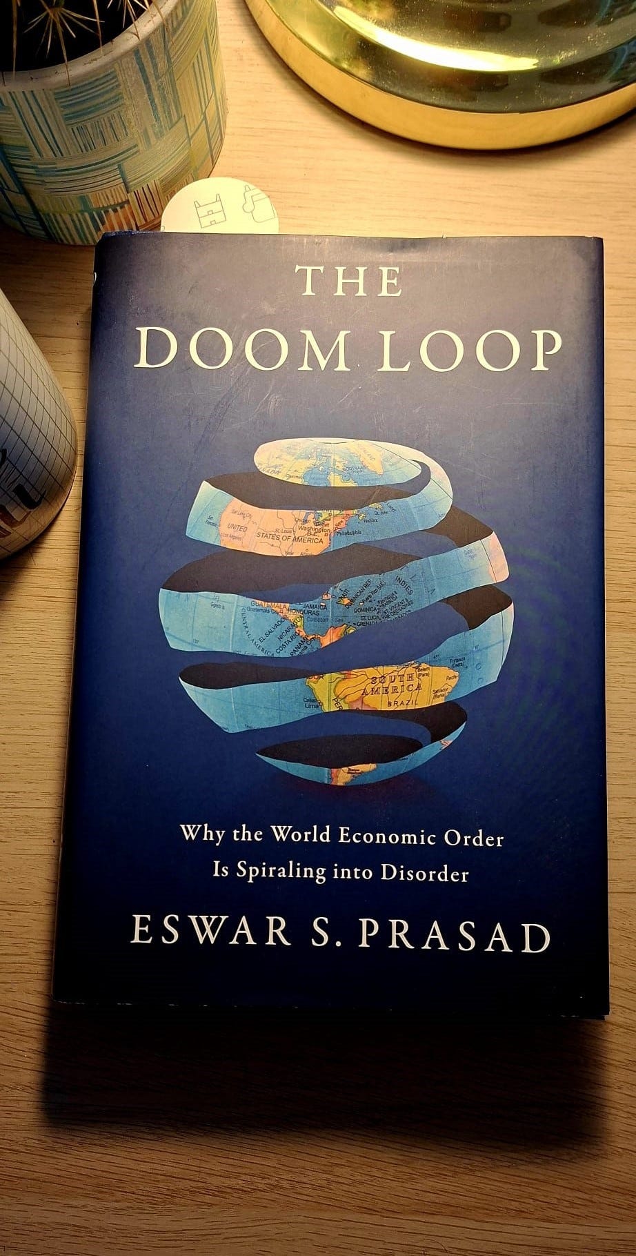 Eswar Prasad’s Doom Loop is my current early morning read - Kevin Thomas Ryan