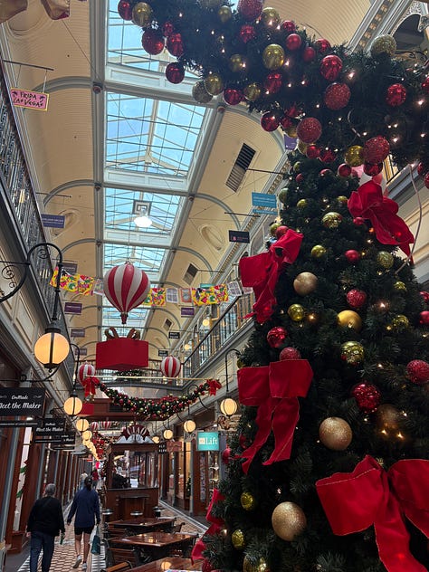 Christmas decorations in Adelaide Arcade, Richard Scarry 'Things I'm grateful for' illustration, books including Sea Green at AGSA.