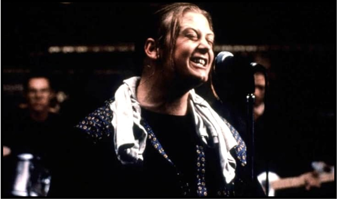 Deco belts out a tune in a scene from the movie, "The Commitments."