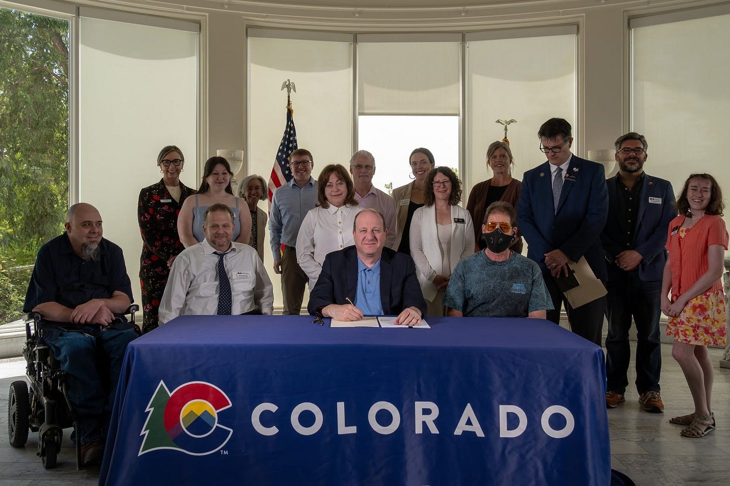 Gov. Jared Polis at a bill signing (Credit: Governor’s office/Facebook) Gov. Jared Polis at a bill signing (Credit: Governor’s office/Facebook)