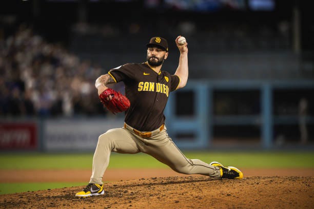 Tanner Scott of the San Diego Padres pitches in the eighth inning of game five of the National League Divisional Series against the Los Angeles...