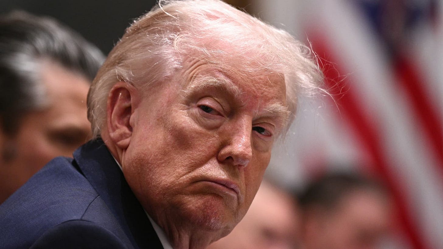 US President Donald Trump listens during a cabinet meeting in the Cabinet Room of the White House in Washington, DC, on January 29, 2026. (Photo by Brendan SMIALOWSKI / AFP via Getty Images)
