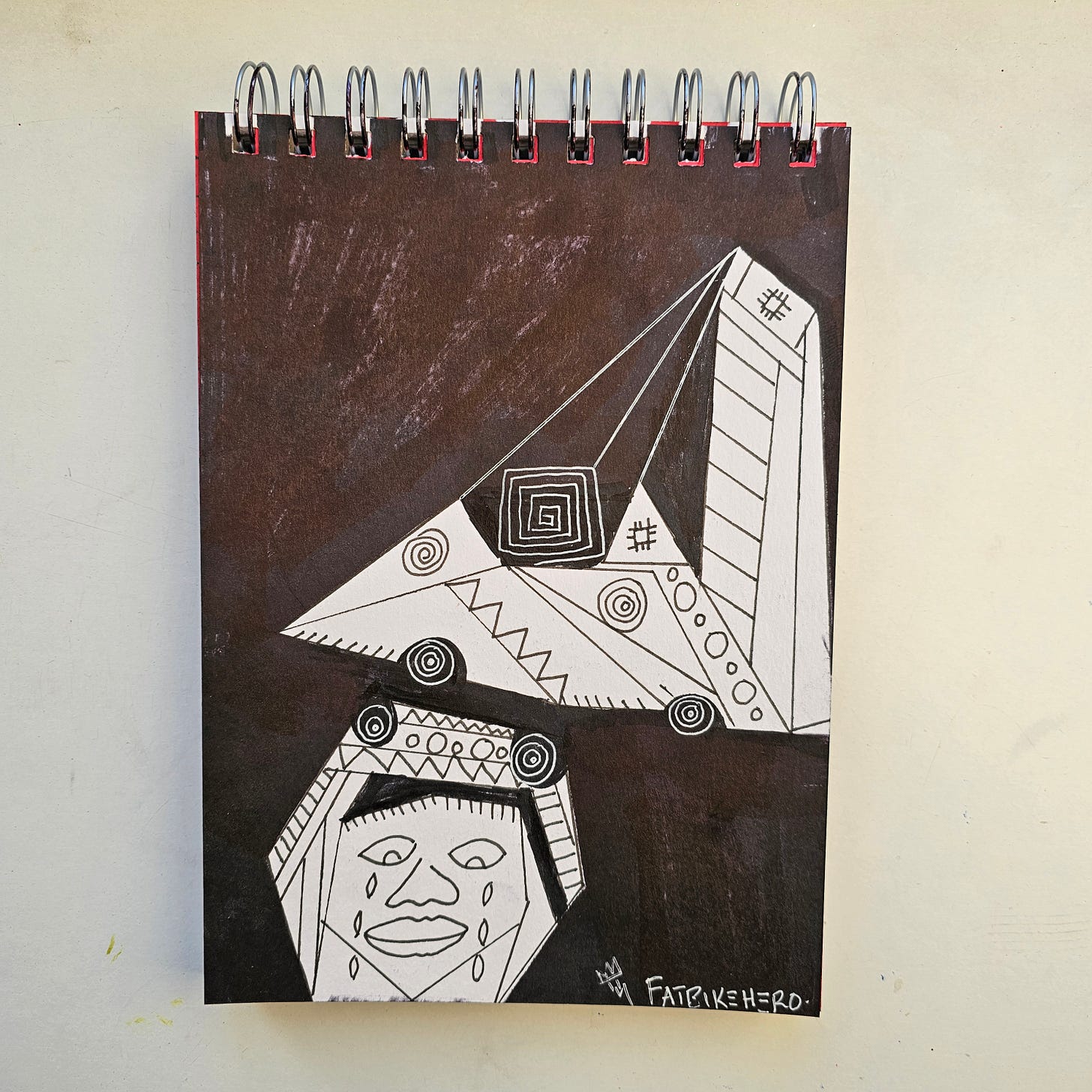 Alt Text: A black and white ink drawing by Fatbikehero featuring a large geometric robot boot crushing a stylized human head with tears.