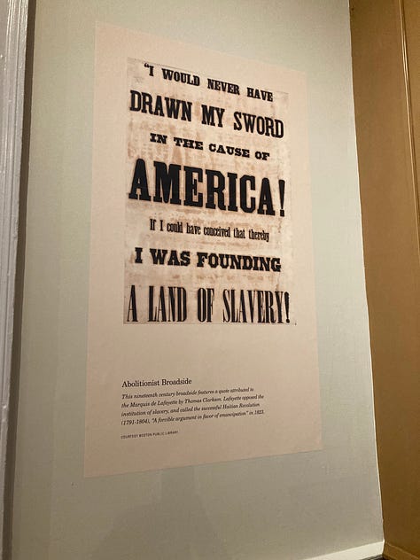 The team from Evolution Printing installs text panels for FAM's exhibit "Lafayette's World: Revolutionary Ideals and the Limits of Freedom" on February 26. The exhibit opens on Friday, March 1.