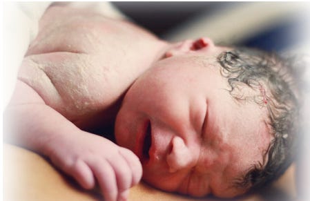 A baby crying on a surface

AI-generated content may be incorrect.