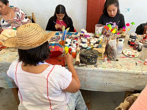 Wood carving and painting the colorful Alebrijes