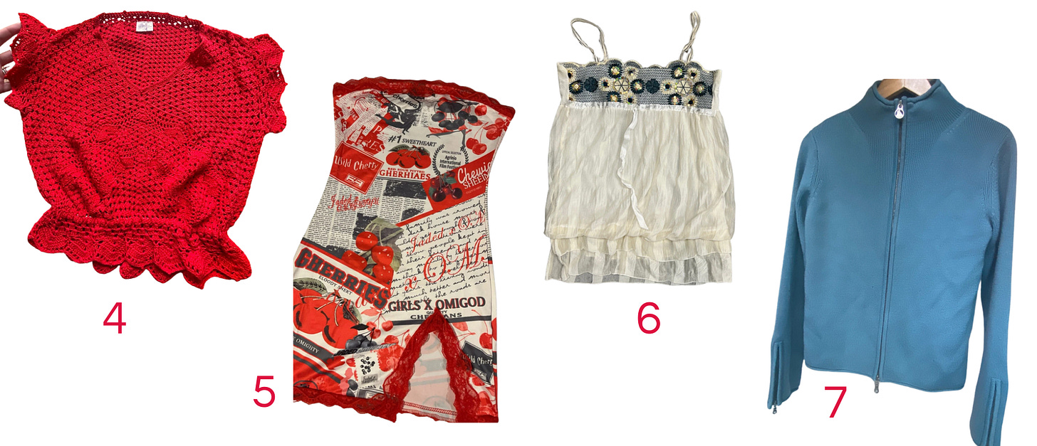 A crochet red top, a strapless mini dress in a cherry and newspaper print, a cami top with a navy and white embellishment at the top, a collared blue zip up top