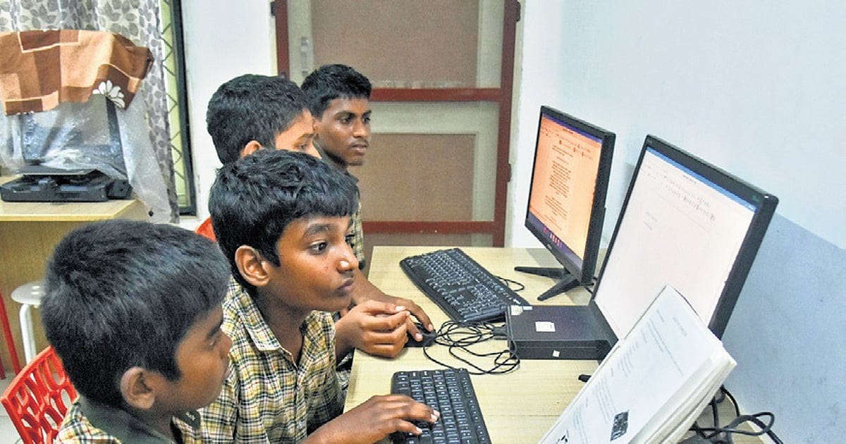 Children learning at a community digital library in Andhra Pradesh